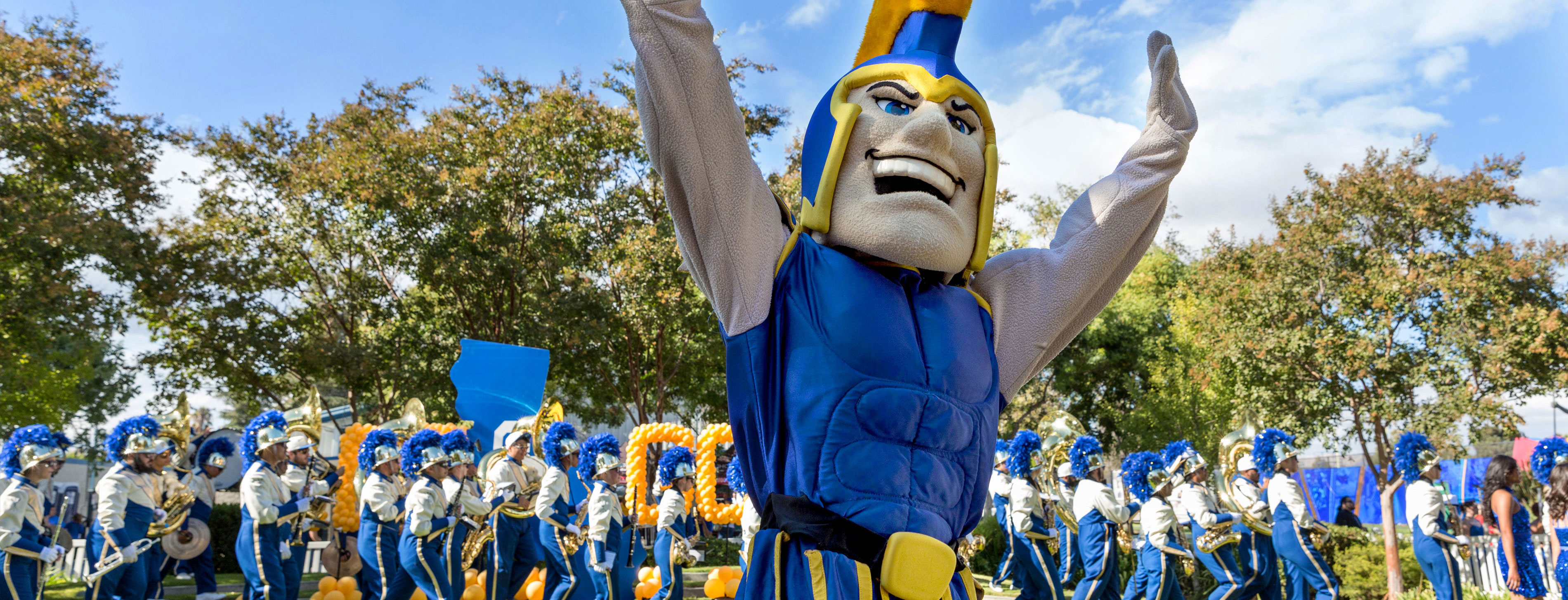 Sammy Spartan and band marching outside.