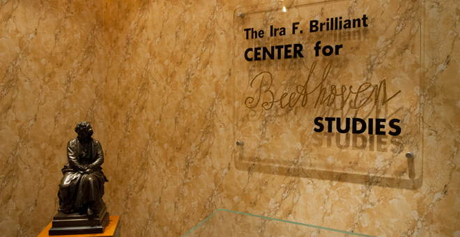 SIgn and statue at the entrance to the Beethoven Center