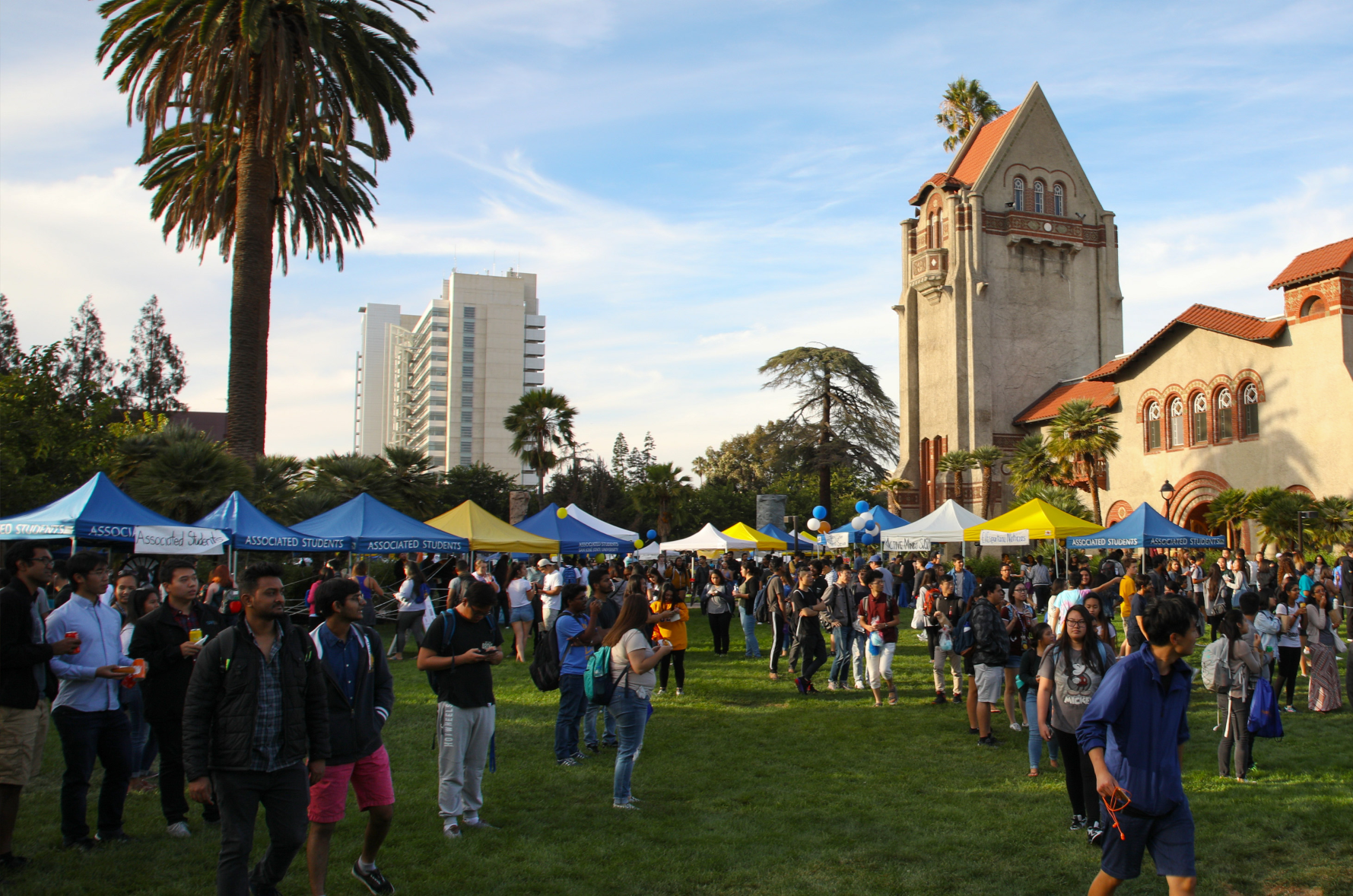 large group of people attending an event on the SJSU  campus