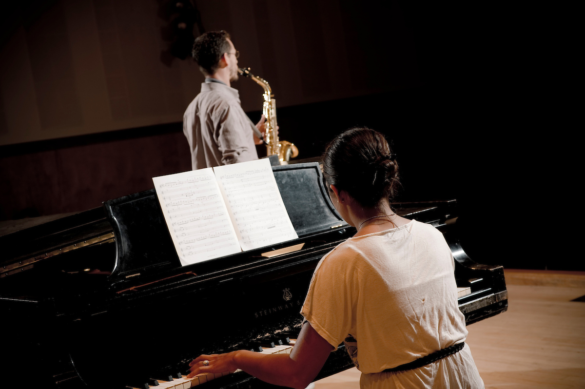 a student playing the piano