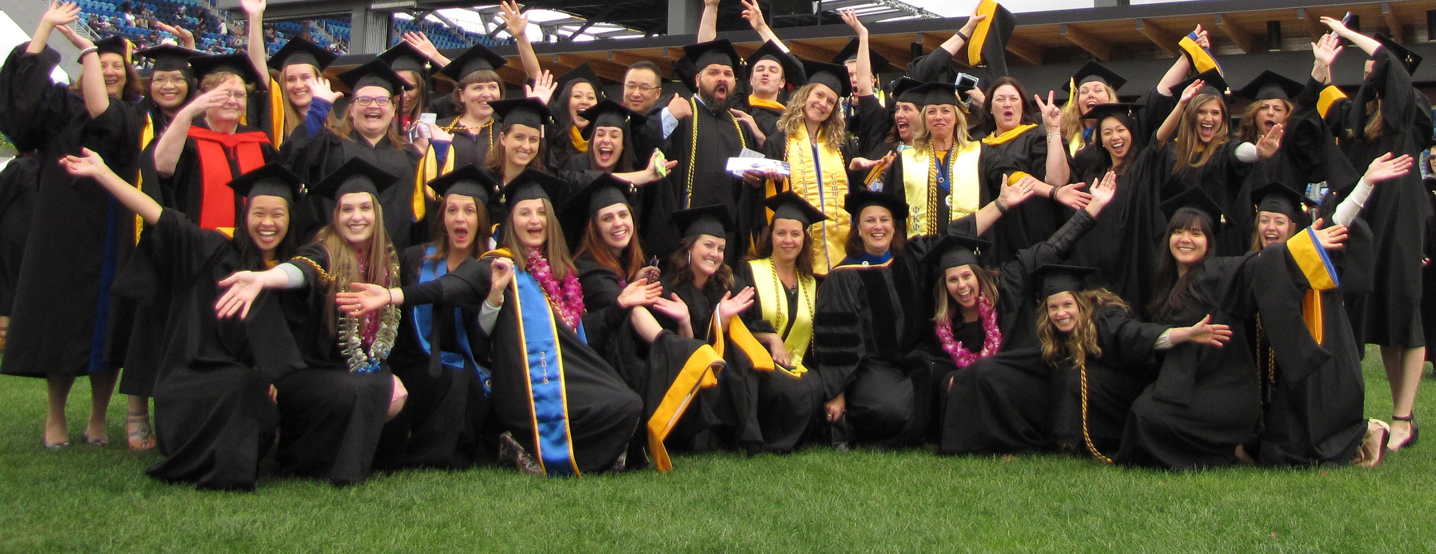 Students posing for a graduation picture