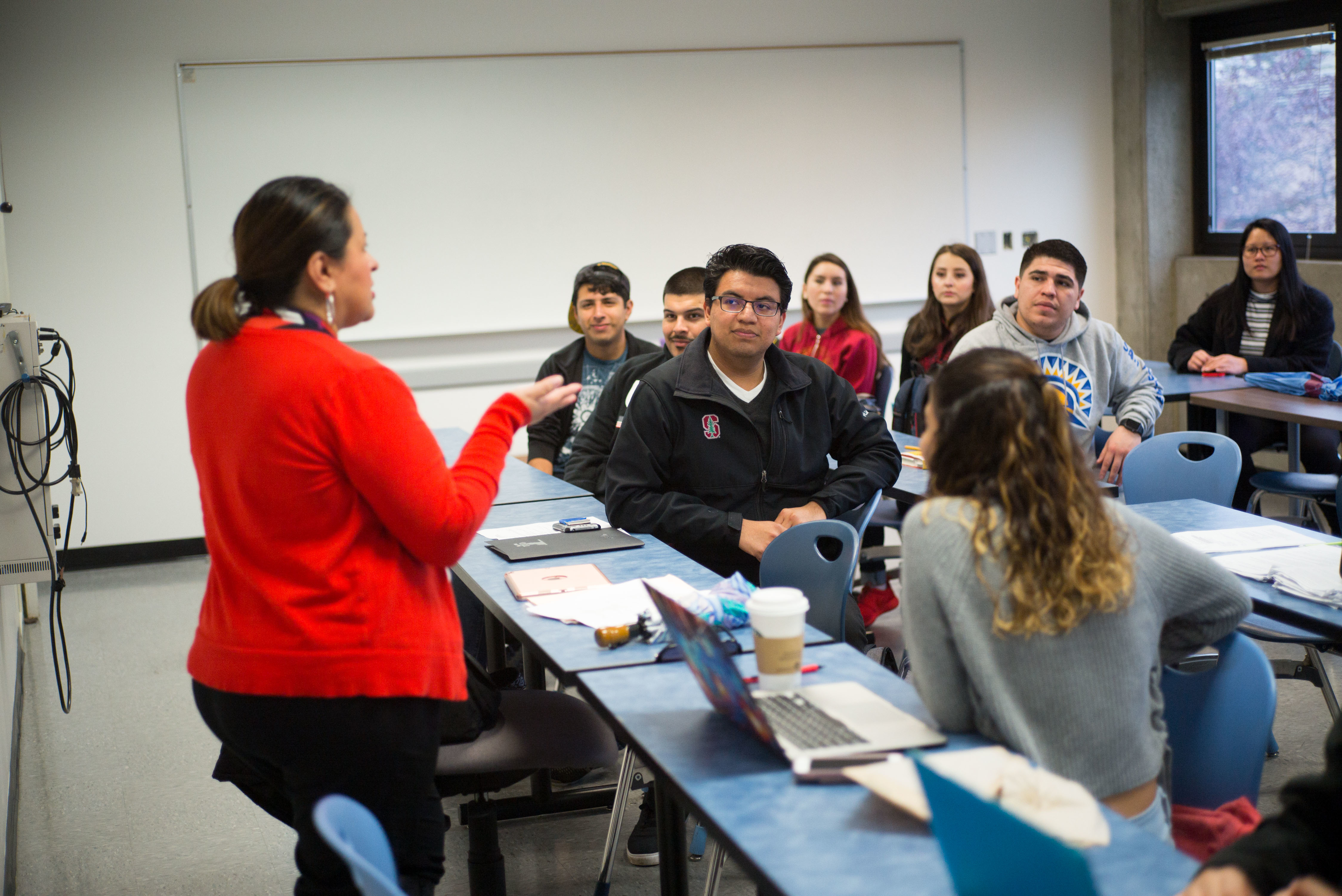 Program Director presenting to a group of students