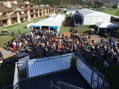 Crowds gather outside concession tents where students are organizing the events