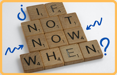 Scrabble tiles lined up to read "If Not Now When"