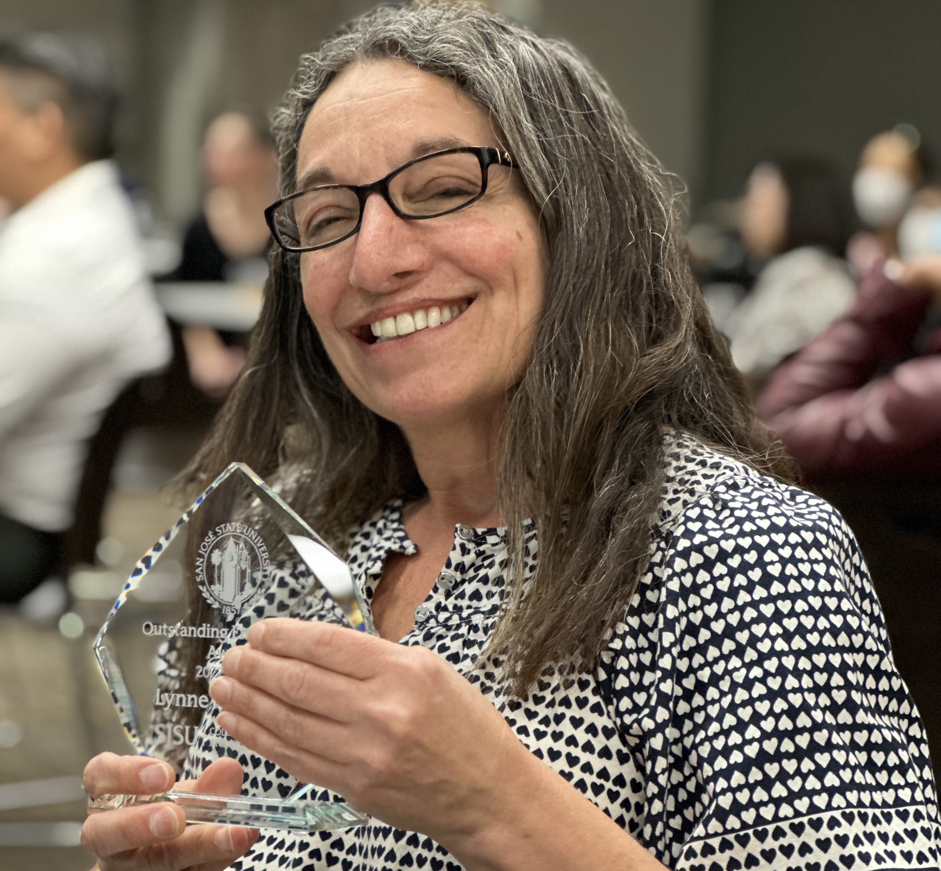 photo of Dr. Lynne Andonian receiving award