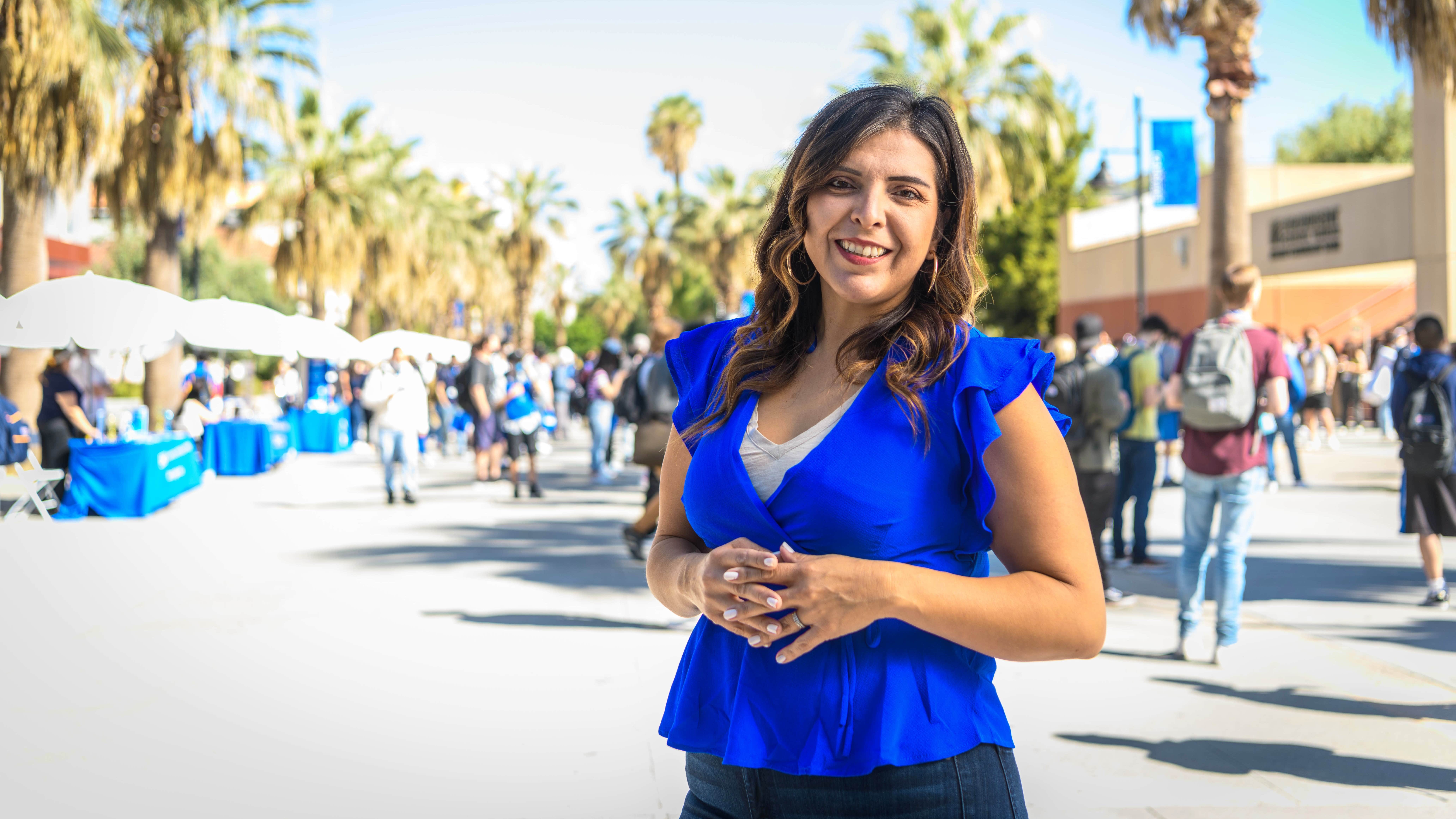 SJSU Online student posing at campus resource fair