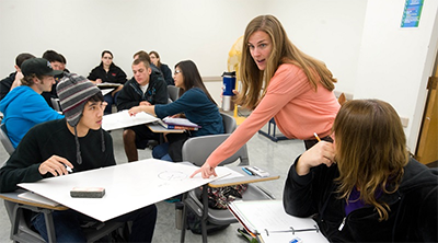 Prof. Cassandra Paul, teaching a class