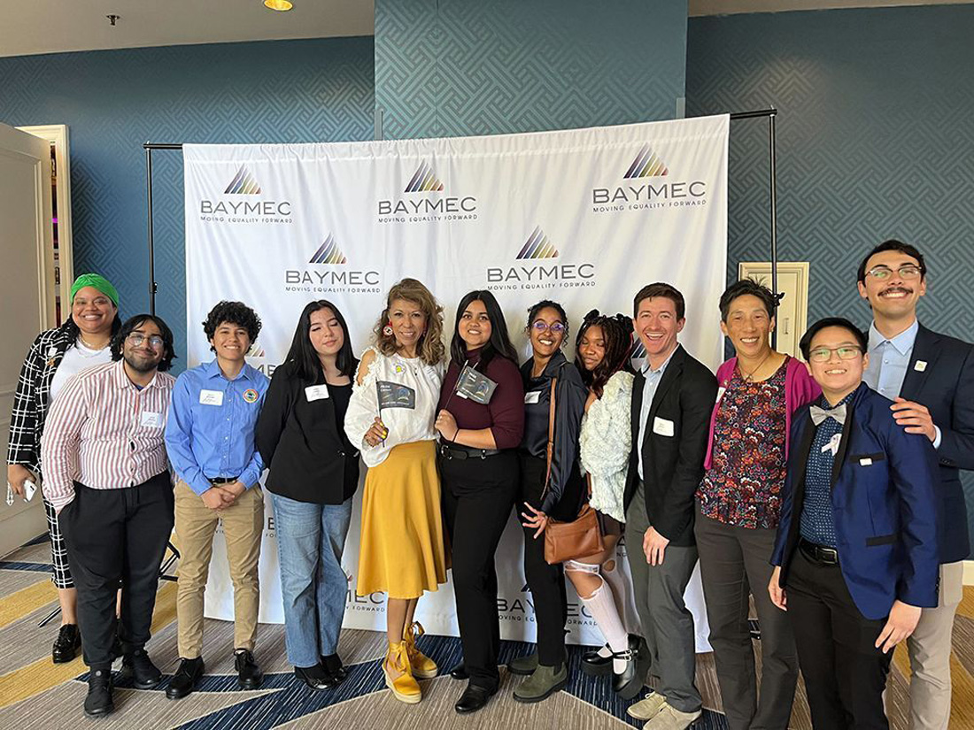 The president posing with BAYMEC attendees.