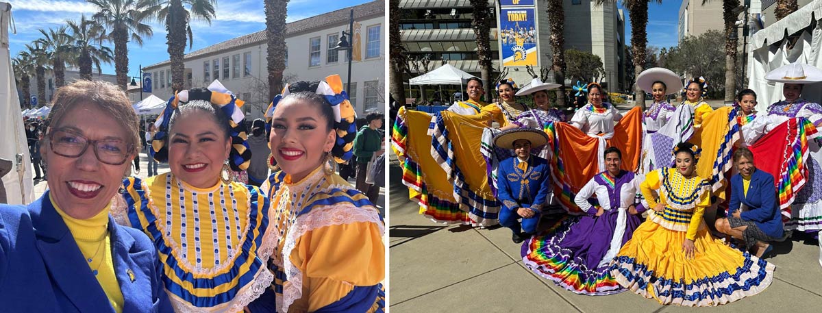 The president posing with student folklorico dancers.