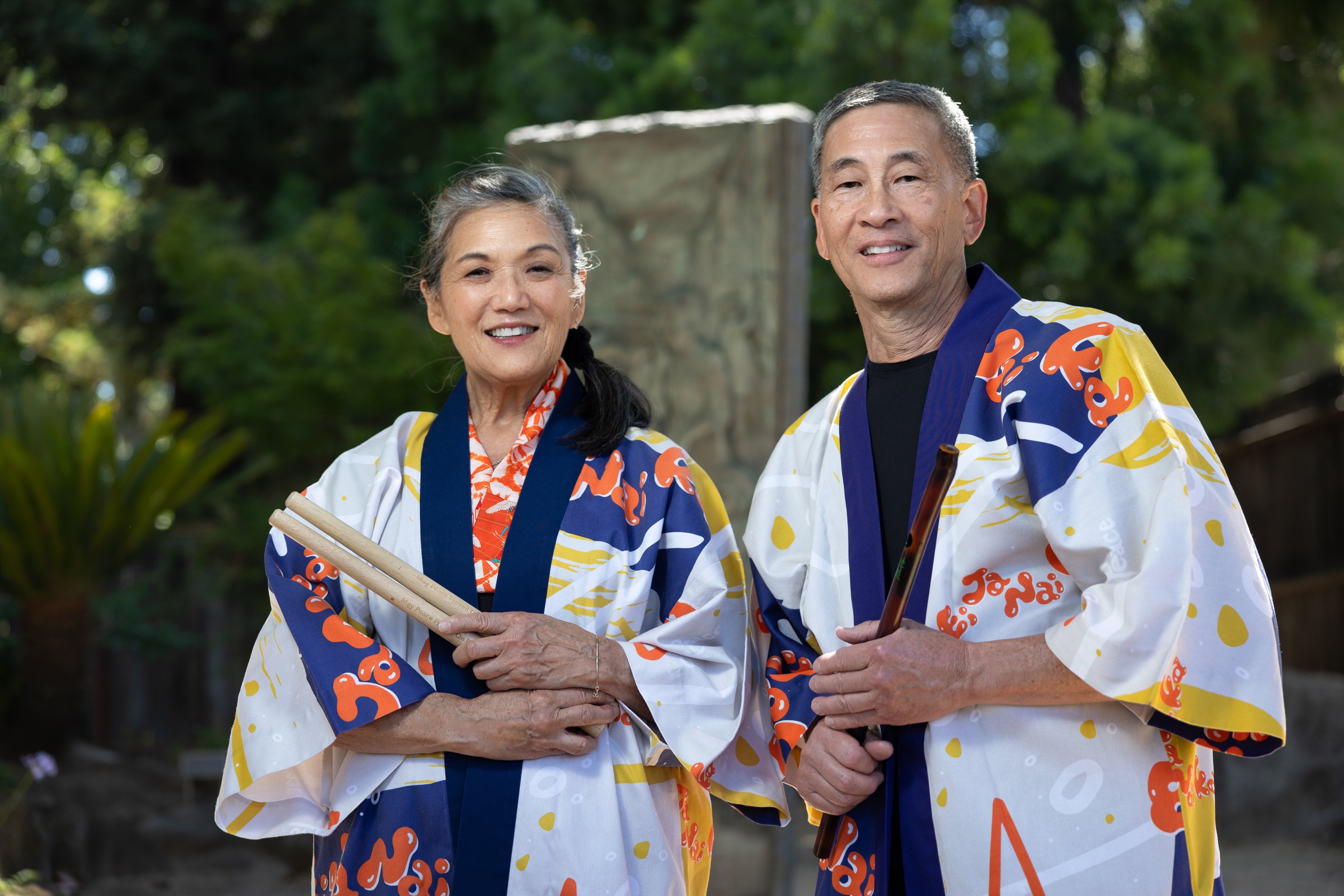 Patti Jo “PJ” Hirabayashi, ’77 MUP (left) and Roy Hirabayashi celebrate 50 years of creating dance, music and art with San José Taiko in 2023. Photo: Jim Gensheimer.