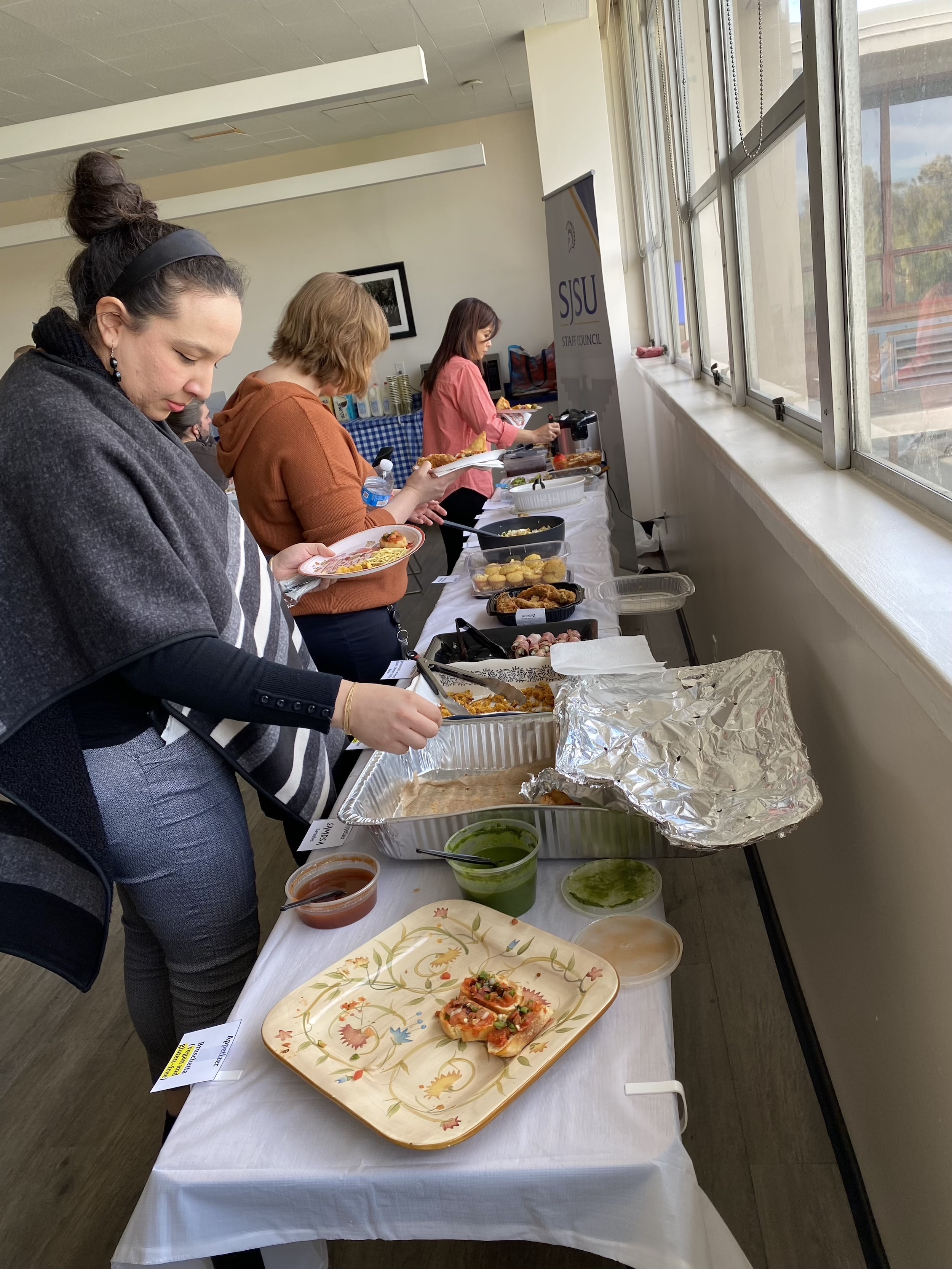 Staff at food table